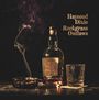 Text: "Hayseed Dixie Rockgrass Outlaws". Eine Flasche, ein Glas und ein Aschenbecher mit brennender Zigarette.