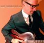 "ANDY FAIRWEATHER LOW SWEET SOULFUL MUSIC" steht oben. Ein Mann im Anzug spielt Gitarre, die Umgebung ist warm getönt.