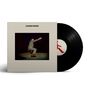 Text: "ALLBARONE VERSIONS".  
Cover zeigt eine Person, die in einem Anzug mit rotem Socken kniet. Schallplatte neben dem Cover.
