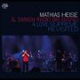 "Mathias Heise & Danish Radio Big Band A Love Supreme Revisited" steht oben, mit Musikern auf einer Bühne im Hintergrund.