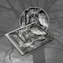 "Unleashed" auf CD und Hülle, darunter "As Yggdrasil Trembles". Baumillustration im Hintergrund.