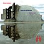 Texte: "Michael Cashmore", "Before The Light Has Gone", "Symphony No. 4". Ein Bunker spiegelt sich in einer Wasserpfütze.