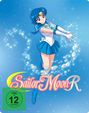 „Sailor Moon R“ in bunten Buchstaben, FSK 12. Illustration: Ein Mädchen in blauer Uniform mit Glitzersternen im Hintergrund.