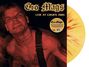 "Cro-Mags Live at CBGB's 1985" steht oben. Ein tätowierter Mann mit energischem Ausdruck. Gelbe Schallplatte daneben.