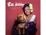 Texte: "Billie Holiday", "The Commodore Masters". Frau mit Blumen im Haar, hält einen Hund, roter Hintergrund.