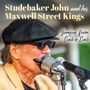 „Studebaker John and his Maxwell Street Kings Jumpin‘ from Limb to Limb.“ Mann mit Sonnenbrille spielt Mundharmonika.