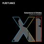 "Solarstone & Orkidea Live in London". Logo "PURE TRANCE". Graue Silhouetten in bunten Buchstaben "XI" auf schwarzem Hintergrund.
