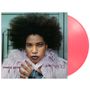 Text: "macy gray", "the id". Porträt einer Frau mit Afro und flauschiger Jacke, daneben eine pinke Vinyl-Schallplatte.