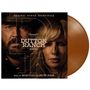 "Original Series Soundtrack, Dutton Ranch, Season 1, Music by Brian Tyler and Breton Vivian." Zwei ernste Gesichter.