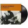 "UNCLE TUPELO NO DEPRESSION" auf einem orangefarbenen Hintergrund; Schwarz-Weiß-Bild von Menschen mit Gitarren.