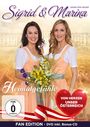 „Heimatgefühle“, „Von Herzen unser Österreich“, „FAN EDITION“. Zwei Frauen in Tracht mit Blumenstrauß.