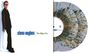 "glenn hughes The Way It Is" in blau und grün. Mann in dunkler Kleidung links. Rechts bunte, gesprenkelte Schallplatten.
