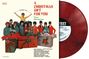 Auf dem Cover in roten Buchstaben "A Christmas Gift For You From Phil Spector". Gruppen posieren hinter Geschenken.
