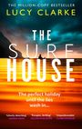 "The Million-Copy Bestseller Lucy Clarke. The Surf House. The perfect holiday until the lies wash in…" Silhouette am Meer.