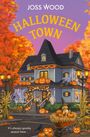 "Halloween Town" und "Joss Wood" stehen in weißer Schrift. Darunter "COVER TO BE REVEALED". Hintergrund ist orange.