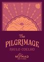 "The Pilgrimage" Paulo Coelho. Sonnenaufgang über Bergen, stilisiert mit Mustern; NOMAD Editions Logo darunter.