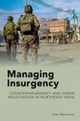 Titel: "Managing Insurgency". Soldaten stehen in einer Stadt. Autor: Alex Waterman.