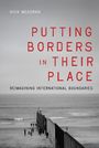 Text: "Nick Megoran", "Putting Borders in Their Place", "Reimagining International Boundaries". Sicht auf eine Grenzmauer am Strand.