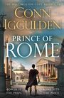 "Conn Iggulden, Prince of Rome. Power is the prize, Rome sets the price." Mann in römischer Kleidung vor antiken Gebäuden.