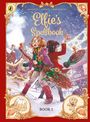 "Elfie's Spellbook, Book 2". Zwei Mädchen mit Besen im Schnee, magische Atmosphäre, Lebkuchen-Dekoration.