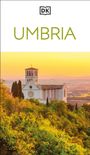 Text: "UMBRIA". Illustration einer Kirche in malerischer Landschaft, umgeben von grünen Bäumen bei Sonnenuntergang.