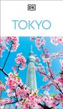 Text: "TOKYO". Kirschblüten vor einem hohen, modernen Turm unter klarem blauem Himmel. Oben ein DK-Logo.