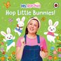 Text: „Ms. Rachel Hop Little Bunnies!“  
Illustration: Frau in rosa und blaue Hasen tanzen fröhlich umher; bunt blühende Blumen und Schmetterlinge.
