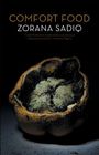 Text: "Comfort Food", "Zorana Sadiq", Zitat von Intermission Magazine. Eine verdorbene Frucht mit Schimmel im Dunkeln.