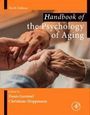 Tenth Edition, "Handbook of the Psychology of Aging", Editors: Denis Gerstorf, Christiane Hoppmann. Hände berühren einander.