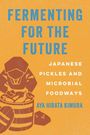 "Fermenting for the Future: Japanese Pickles and Microbial Foodways" von Aya Hirata Kimura. Eine Person arbeitet an einem Fass.