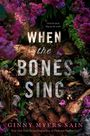 „When the Bones Sing“. „Find the dead. Dig up the truth.“ Blumen, Kompass, Knochen und Erde sind sichtbar.