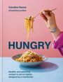 Caroline Hanna @healthbycaroline. HUNGRY. Spaghetti auf Gabel und Teller vor rosa Hintergrund.