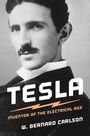 "TESLA, Inventor of the Electrical Age, W. Bernard Carlson." Ein Porträt eines Mannes mit Schnurrbart in Anzug.