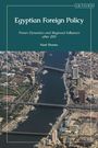 "Egyptian Foreign Policy: Power Dynamics and Regional Influence after 2011" von Nael Shama. Luftaufnahme einer Stadt mit Fluss.