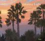 "California Light: A Century of Landscapes" von Jean Stern und Molly Siple. Palmen bei Sonnenuntergang mit pastellfarbenem Himmel.