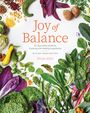 "Joy of Balance", Anleitung zu ayurvedischem Kochen. Buntes Gemüse und Blätter umrahmen den Text.