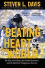 „BEATING HEART OF THE WORLD“ in großen gelben Buchstaben. Szene: Menschen in traditioneller Kleidung mit Esel.