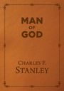 "MAN OF GOD" und "CHARLES F. STANLEY" auf einem braunen, lederähnlichen Hintergrund mit dekorativem Randmuster.