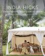 „INDIA HICKS: ENTERTAINING, WITH A SIDE OF CHAOS. PRINCIPAL PHOTOGRAPHY BRITTAN GOETZ.“ Frau in elegantem Zelt mit Hund.
