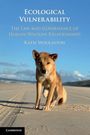 "Ecological Vulnerability: The Law and Governance of Human-Wildlife Relationships" von Katie Woolaston. Hund auf Sandstrand.
