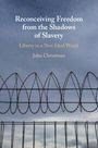 "Reconceiving Freedom from the Shadows of Slavery: Liberty in a Non-Ideal World" von John Christman. Stacheldraht vor Wolken.