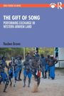 "The Gift of Song: Performing Exchange in Western Arnhem Land" von Reuben Brown. Tanzende, bemalte Männer im Freien.