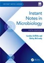Text: "Instant Notes in Microbiology", "Fifth Edition", "Caroline Griffiths and Shirley McCready". Blau-weißes geometrisches Design.