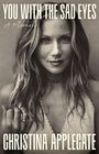 "YOU WITH THE SAD EYES", "A Memoir" und "CHRISTINA APPLEGATE" über einem Schwarzweißfoto einer Frau mit langen Haaren.