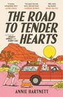 Buchtitel "The Road to Tender Hearts" von Annie Hartnett. Illustration: Rotes Auto in Wüstenlandschaft bei Sonnenuntergang.