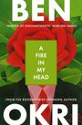 "A Fire In My Head", großes "BEN OKRI". Illustration: Rote Rose, grüner Hintergrund. Text "Master of Enchantments" von Marlon James.
