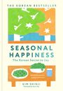 "THE KOREAN BESTSELLER" oben, "SEASONAL HAPPINESS" in der Mitte. Illustration: Bäume, Tisch mit Gemüse.