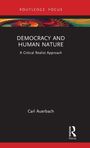 "Democracy and Human Nature: A Critical Realist Approach" von Carl Auerbach, mit einem bunten Spiralmuster.
