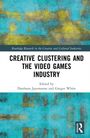 "Creative Clustering and the Video Games Industry" von Darshana Jayemanne und Gregor White. Abstrakte blaue und gelbe Muster.