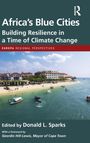 "Africa's Blue Cities: Building Resilience in a Time of Climate Change" von Donald L. Sparks. Strand mit Booten.